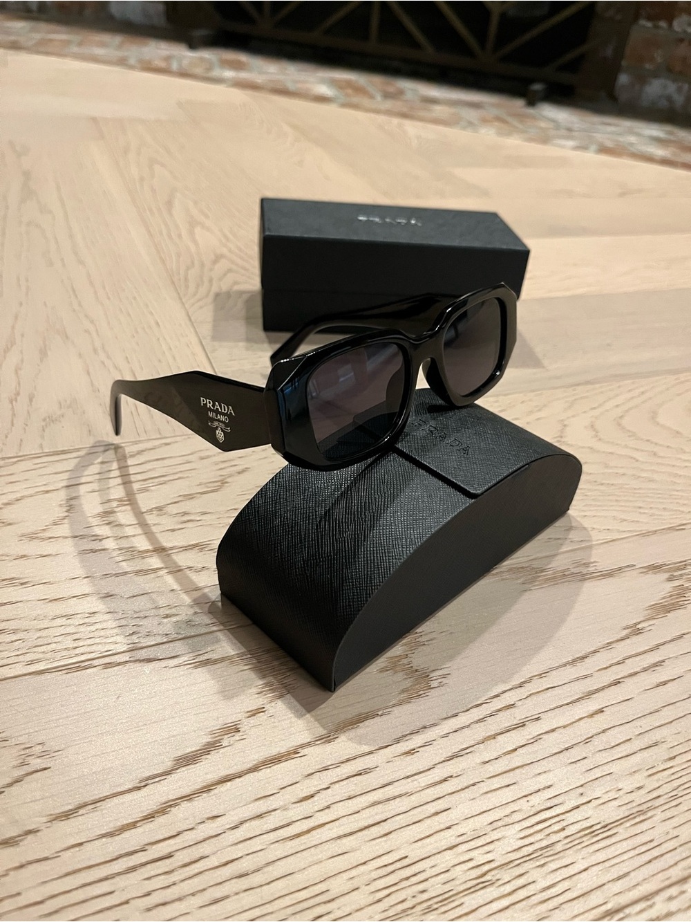 Prada Glossy Black Rectangular Sunglasses with Logo Temples
